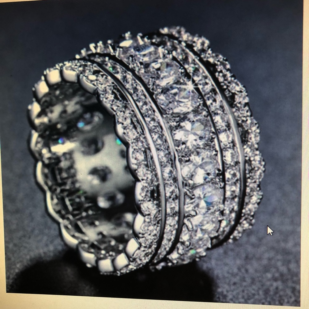 Silver and white sapphire band